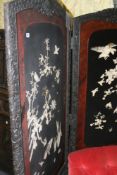 AN ORIENTAL LACQUERED AND INLAID FOLDING SCREEN