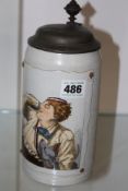 A METTLACH GERMAN POTTERY STEIN PEWTER LID, POLYCHROME DECORATION OF A DRINKING MAN AND HIS DOG