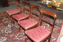 A SET OF FOUR REGENCY ROSEWOOD DINING CHAIRS