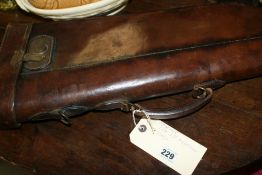 A LEG OF MUTTON LEATHER GUN CASE TOGETHER WITH A FURTHER LEATHER GUN CASE********WITHDRAWN BY