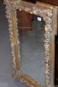 A VICTORIAN GILT FRAMED MIRROR