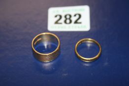 TWO 22CT.GOLD WEDDING BANDSapprox 14 grams