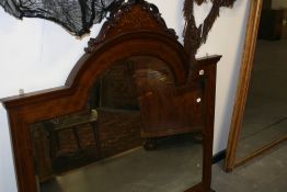 A LARGE MAHOGANY AND INLAID OVER MANTLE MIRROR