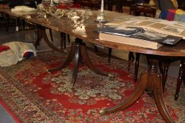 A REGENCY STYLE THREE PILLAR MAHOGANY DINING TABLE