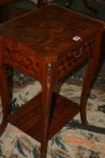 A CONTINENTAL INLAID AND BRASS MOUNTED SIDE TABLE