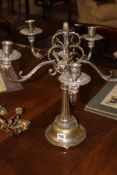A PAIR OF SILVERPLATE FIVE BRANCH CANDELABRA