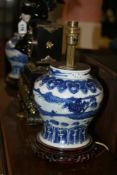 A PAIR OF CHINESE BLUE AND WHITE BALUSTER VASES WITH LANDSCAPE DECORATION MOUNTED AS LAMPS