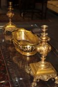 A PAIR OF VICTORIAN ORMOLU CANDLESTICKS TOGETHER WITH A GILT CENTREPIECE