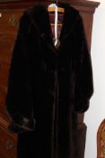 A LADIES FULL LENGTH DESIGNER COAT FOUR SEASONS MODEL