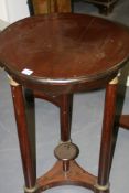 A BIEDERMEIR MAHOGANY OCCASIONAL TABLE WITH GILT BRASS MOUNTS