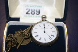 A SILVER CASED SMALL POCKET WATCH AND BRASS CHAIN