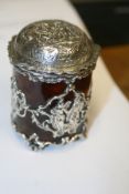 An Edwardian tortoiseshell and silver dressing table jar with marks for London 1905 and 1908 by