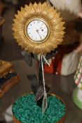 AN INTERESTING DESK CLOCK IN THE FORM OF A SUNFLOWER