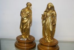 A PAIR OF HALLMARKED SILVER GILT FIGURES OF CLASSICAL LADIES BY REILY AND STORER