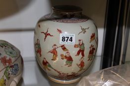 A SMALL CHINESE VASE DECORATED WITH FIGURES OF CHILDREN PLAYING, THE BASE WITH TWO STICKERS FOR
