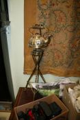 AN ARTS AND CRAFTS STYLE KETTLE ON STAND AND A NEEDLEWORK PANEL
