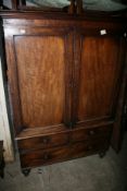 A LATE GEORGIAN MAHOGANY LINEN PRESS