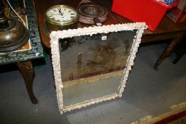 A SHELL DECORATED MIRROR