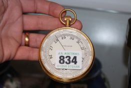 T. WHEELER, LONDON 1941: A MINISTRY OF DEFENCE BRASS COMPENSATED POCKET BAROMETER.