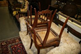 A SET OF FOUR 19TH.C.WALNUT SIDE CHAIRS