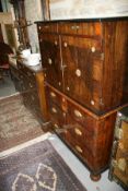 AN 18TH.C.OYSTER VENEERED FITTED CABINET OVER A THREE DRAWER CHEST