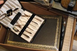 ASSORTED PLATED CUTLERY AND A JEWELLERY BOX.