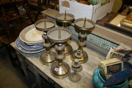 A SET OF FOUR LARGE PRICKET CANDLESTICKS AND TWO OTHERS
