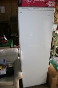 A LARGE UPRIGHT FREEZER