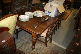 A WM.IV.MAHOGANY EXTENDING DINING TABLE WITH TWO LEAVES