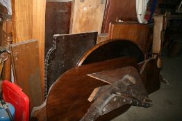 A LARGE QTY OF 19TH.C AND LATER MAHOGANY TABLE TOPS, PANELS,ETC