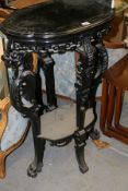 AN ANTIQUE EBONISED JARDINIERE STAND AND AN EBONISED BENTWOOD ROCKING CHAIR