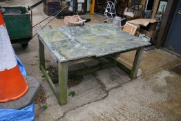 A MARBLE TOPPED GARDEN TABLE