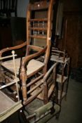 TWO VICTORIAN ROCKING CHAIRS, A BOOKCASE, AN OAK TABLE, A BAMBOO SHELF, AN ARMCHAIR, A BRASS