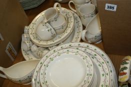 A WEDGWOOD GREEN LEAF PATTERN DINNER SERVICE AND COFFFEWARES, A PAIR OF DECANTERS, CHINA ,GLASS,ETC