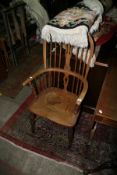 A WINDSOR ARMCHAIR