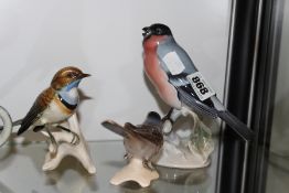 A ROSENTHAL BULLFINCH TOGETHER WITH TWO SIMILAR CERAMIC BIRD FIGURES.