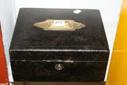 A LEATHER BOUND STATIONERY BOX