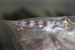 A DIAMOND AND RUBY BAR BROOCH AND ONE OTHER PIECE.