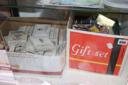 A COLLECTION OF MATCH BOXES AND MATCH BOOKS TOGETHER WITH A COLLECTION OF CIGARETTE PACKETS.