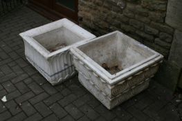 A pair of large carved marble square form terrace urns, 59cm square. (2)