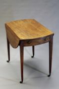 A Regency mahogany crossbanded and inlaid pembroke table, the oval top above end drawer, on square