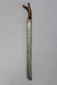 A horn hilted Indonesian short sword, 56.5cm heavy damascus blade, characteristic upswept horn hilt,