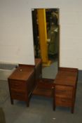 Heals: an oak dressing table with tall central mirror flanked by low drawers, 106cm wide.