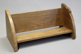 Mouseman workshops: an oak book trough, carved with mouse signature, 45.5cm wide.