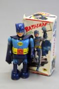 A Japanese vintage Batman toy of tin plate and rubber construction with battery operated walking