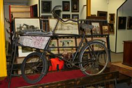 A Dutch mid 20th Century delivery bike, painted black.