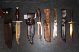 A Rory Conner Irish Pattern Hand Made Bowie knife, 15.5cm clipped back blade, two piece riveted wood