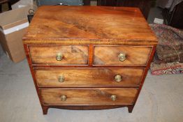 A 19th Century mahogany and inlaid small chest, the caddy top above two short and two long