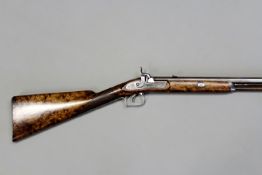 A single barrelled percussion 20-bore rifle by Braggs, 29.25inch sighted octagonal browned