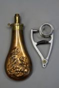 A rare Hardy`s of Alnwick humane bird despatcher, together with an embossed copper powder flask